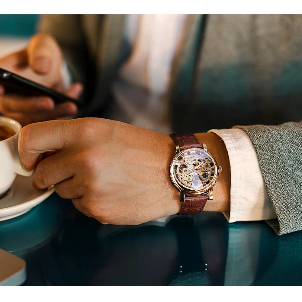 ساعة وينر شفافة أنيقة بتصميم كاجوال فاخر بسوار جلدي للرجال من أفضل العلامات التجارية الفاخرة بهيكل عظمي ميكانيكي